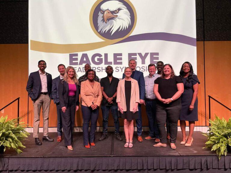 A group photo of the speakers at the Eagle Eye Symposium